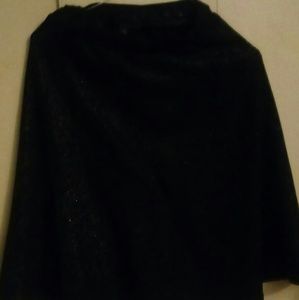 Black shiny knee length skirt
